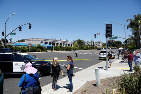 San Diego Police secure the scene of a shooting incident at the Congregation Chabad synagogue in Poway, north of San Diego, California, U.S. April 27, 2019. REUTERS/John Gastaldo