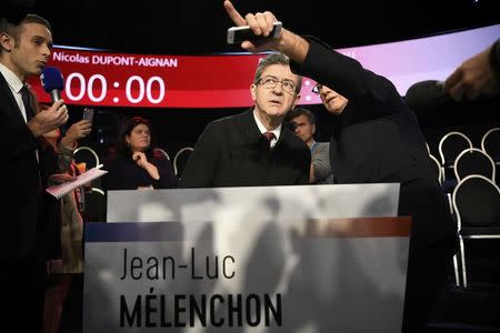 Jean-Luc Melenchon of the Parti de Gauche arrives at the television studio where the eleven candidates will attend a prime-time televised debate for the French 2017 presidential election in La Plaine Saint-Denis, near Paris, France, April 4, 2017. REUTERS/Lionel Bonaventure/Pool
