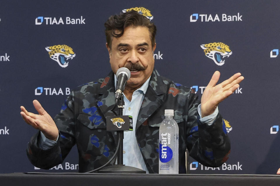 Jacksonville Jaguars owner Shad Khan introduces first-round draft pick offensive lineman Anton Harrison at an NFL football news conference in Jacksonville, Fla., Friday, April 28, 2023. (AP Photo/Gary McCullough)