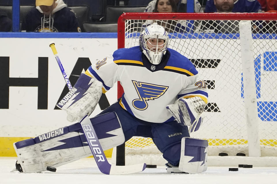 St. Louis Blues emergency goaltender Kyle Konin warms up before an NHL hockey game against the Tampa Bay Lightning Thursday, Dec. 2, 2021, in Tampa, Fla. Konin was called into service when goaltender Jordan Binnington was diagnosed with coronavirus. (AP Photo/Chris O'Meara)