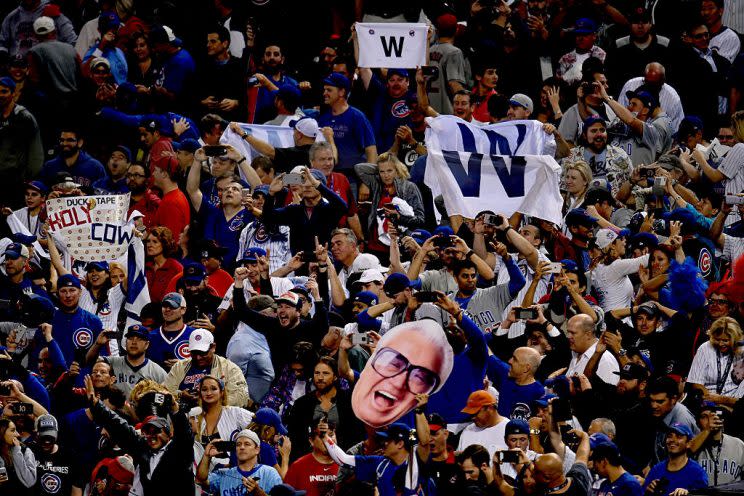 CLEVELAND, OH - NOVEMBER 02: Chicago Cubs fans celebrate after the Cubs defeated the Cleveland Indians 8-7 in Game Seven of the 2016 World Series at Progressive Field on November 2, 2016 in Cleveland, Ohio. The Cubs win their first World Series in 108 years. (Photo by Jason Miller/Getty Images)