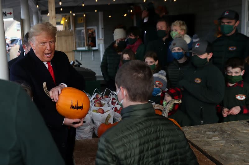 U.S. President Donald Trump visits Treworgy Family Orchards in Levant