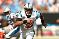 Sep 23, 2018; Charlotte, NC, USA; Carolina Panthers quarterback Cam Newton (1) carries the ball in the third quarter against the Cincinnati Bengals at Bank of America Stadium. Mandatory Credit: Jeremy Brevard-USA TODAY Sports