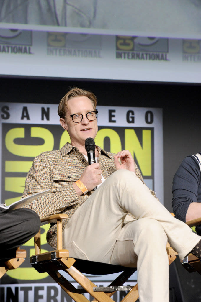 JD Payne speaks onstage at "The Lord of the Rings: The Rings of Power" panel during 2022 Comic-Con International