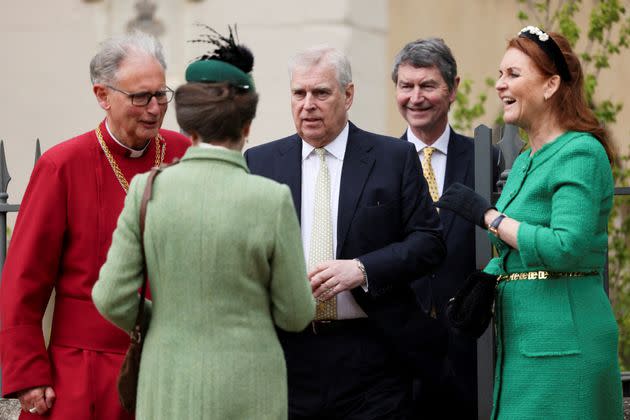 Prince Andrew, Princess Anne, Vice Admiral Timothy Laurence and Sarah Ferguson speak together as they leave St. George's Chapel. 