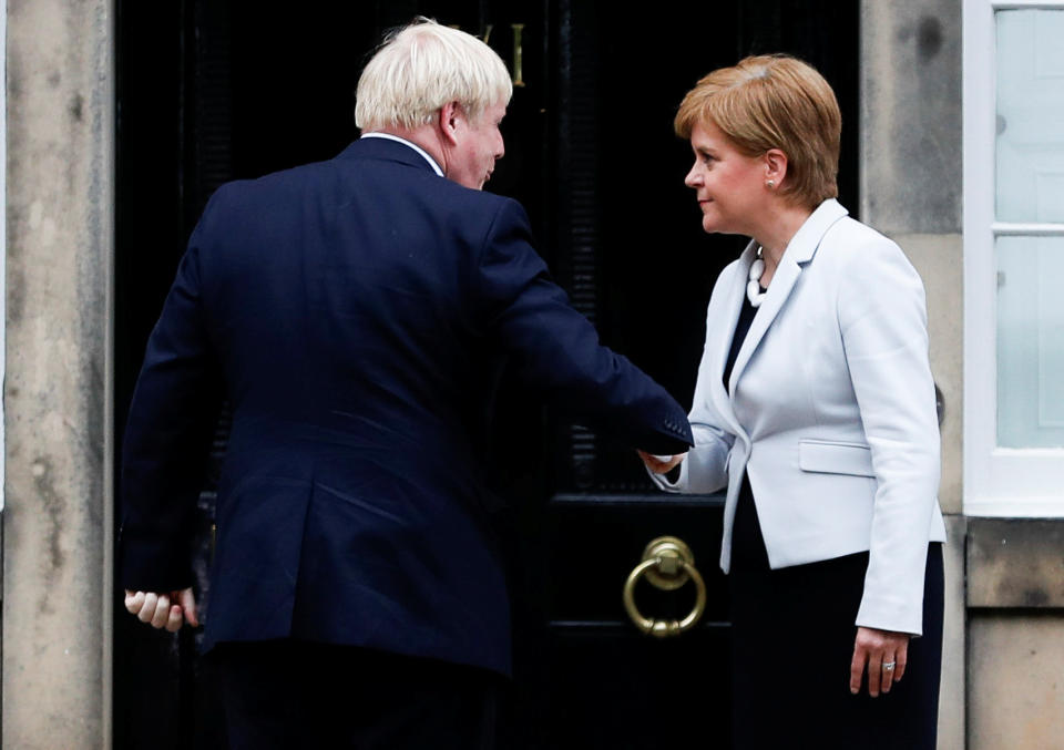 Britain's Prime Minister Boris Johnson shakes hands with Scotland's First Minister Nicola Sturgeon at Bute House in Edinburgh, Scotland, Britain July 29, 2019. REUTERS/Russell Cheyne