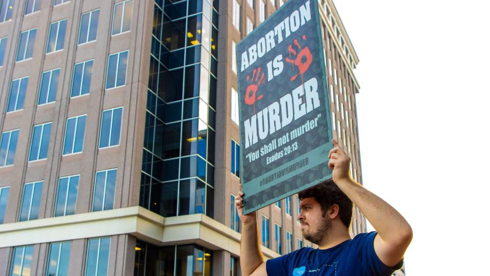 A pro-life protester at an abortion-related rally.