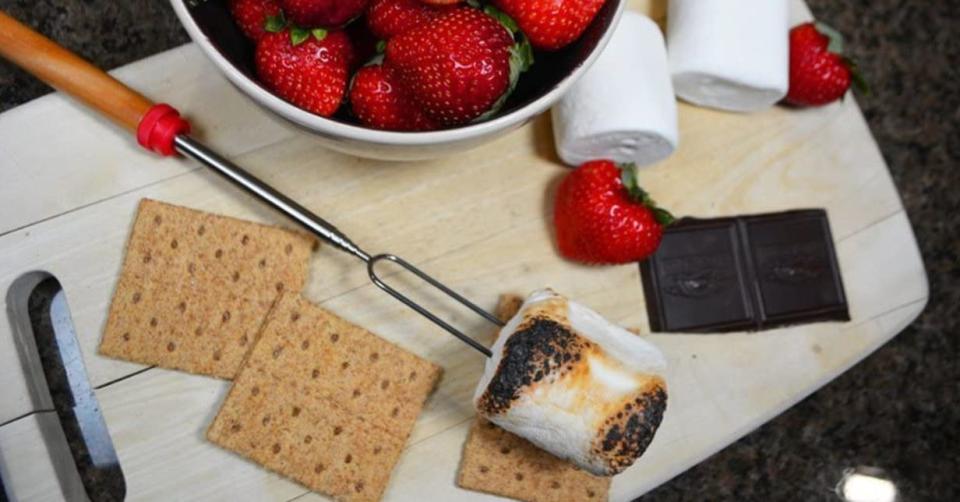 If you're having a backyard s'mores night, your marshmallows will get nice and toasty without creating a goopy mess. Each roasting stick comes with two prongs and material that doesn't warm up too much.<br /><br /><strong>Promising review:</strong> "I have other telescopic roasting sticks but bought these ones because I find the prong on my other ones a bit too widely spaced. <strong>These ones are perfect for roasting a single marshmallow, holding one on two prongs so that it doesn&rsquo;t rotate as it gets warm. The tips are dull, so they are ideal for young kids to use safely.</strong> The pole has a nice rubber end to hold and the metal does not get warm all the way up so it keeps your hand safe. The length of them is great." &mdash; <a href="https://amzn.to/2PiJSxo" target="_blank" rel="nofollow noopener noreferrer" data-skimlinks-tracking="5580838" data-vars-affiliate="Amazon" data-vars-href="https://www.amazon.com/gp/customer-reviews/R3CGEJPD908Y51?tag=bfgenevieve-20&amp;ascsubtag=5580838%2C19%2C33%2Cmobile_web%2C0%2C0%2C1159936" data-vars-keywords="cleaning" data-vars-link-id="1159936" data-vars-price="" data-vars-product-id="16176882" data-vars-retailers="Amazon">Amazon Customer</a><br /><br /><strong>Get an 8-pack from Amazon for <a href="https://amzn.to/3sRT0a5" target="_blank" rel="nofollow noopener noreferrer" data-skimlinks-tracking="5580838" data-vars-affiliate="Amazon" data-vars-asin="B071NP7R23" data-vars-href="https://www.amazon.com/dp/B071NP7R23?tag=bfgenevieve-20&amp;ascsubtag=5580838%2C19%2C33%2Cmobile_web%2C0%2C0%2C1159975" data-vars-keywords="cleaning" data-vars-link-id="1159975" data-vars-price="" data-vars-product-id="15928352" data-vars-product-img="https://m.media-amazon.com/images/I/41ItOOH5aJL.jpg" data-vars-product-title="Ajmyonsp Marshmallow Roasting Sticks with Wooden Handle Extendable Forks Set of 5Pcs Telescoping Smores Skewers for Campfire Firepit and Sausage BBQ, 32 Inch" data-vars-retailers="Amazon">$9.98+</a> (available in four colors).</strong>