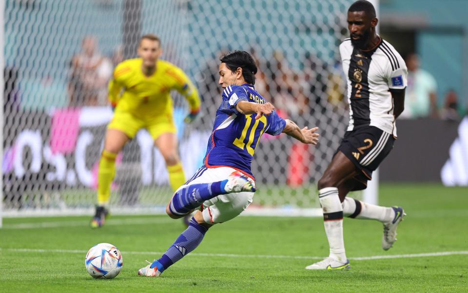 Minamino picks off a well-timed ball from Mitoma, completing a spectacular run... - Pawel Andrachiewicz/Getty Images