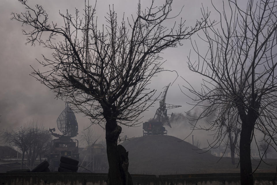 FILE - Smoke rise from an air defence base in the aftermath of an apparent Russian strike in Mariupol, Ukraine, Thursday, Feb. 24, 2022. (AP Photo/Evgeniy Maloletka, File)
