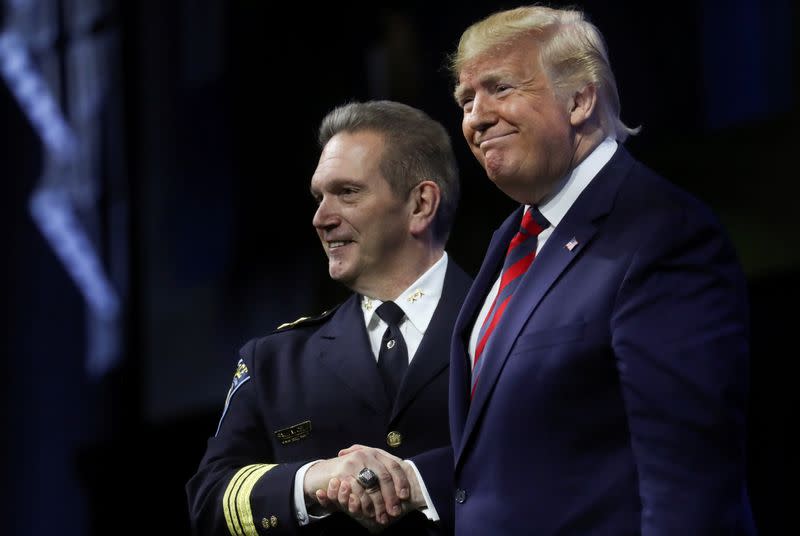 FILE PHOTO: U.S. President Trump attends International Association of Chiefs of Police annual conference and expo in Chicago