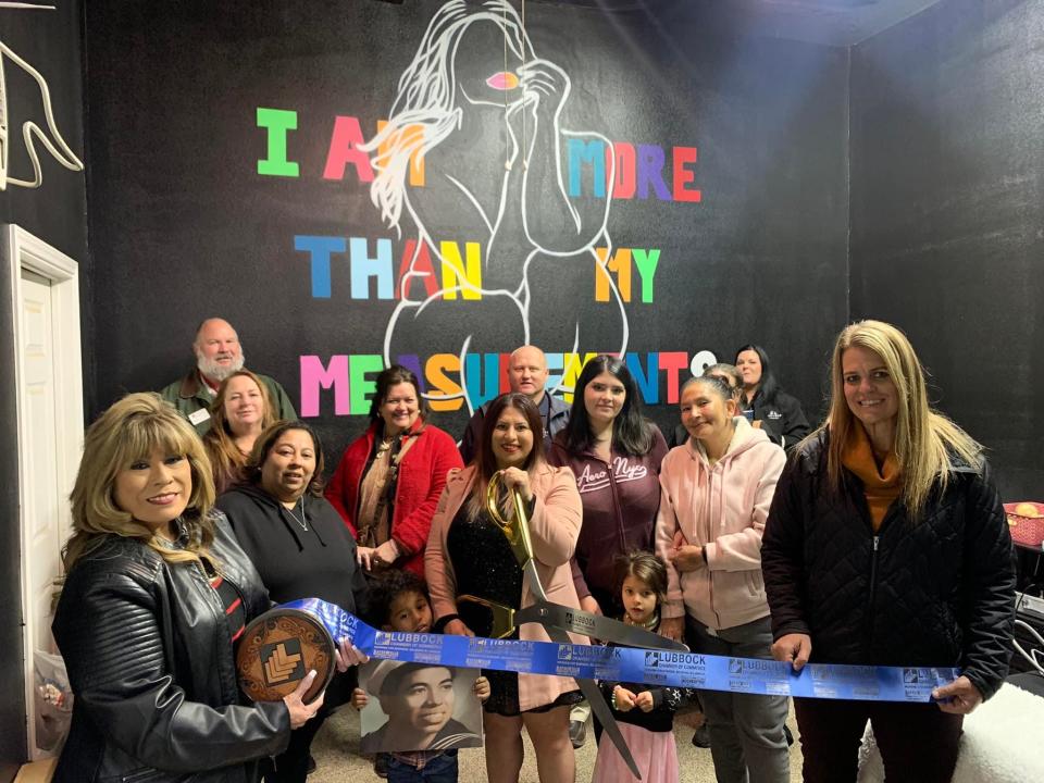 Figure Eight Enhanced Beauty and Wellness, LLC, 2614 130th St., Ste. 11. Holding scissors is owner Syann Armienta. Holding ribbon are Chamber Ambassadors Janie Zuniga, left, and Renee Beavers. Others pictured are family, friends and Lubbock Chamber Ambassadors.