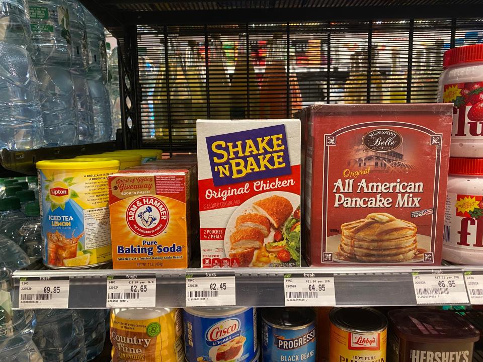 an assortment of american food products on the shelves of an irish grocery store