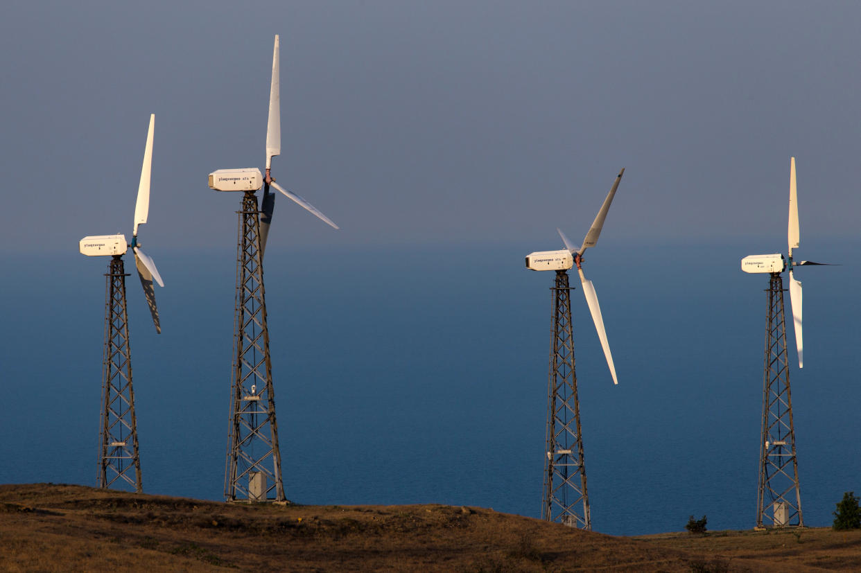 REPUBLIC OF CRIMEA, RUSSIA - JUNE 11, 2020: Wind turbines on Cape Meganom. Sergei Malgavko/TASS (Photo by Sergei Malgavko\TASS via Getty Images)