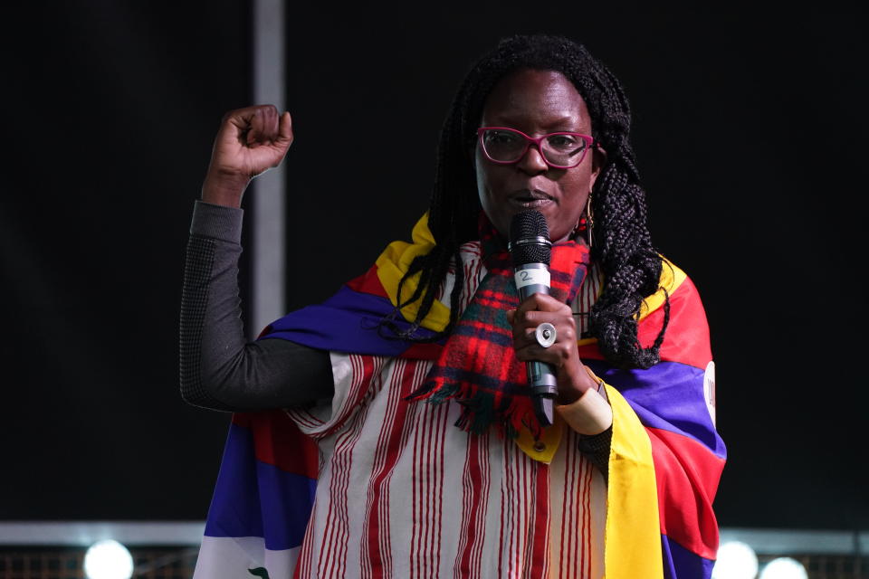 Namibia’s climate activist Ina-Maria Shikongo speaks on the stage of a demonstration in Glasgow, Scotland, Friday, Nov. 5, 2021 which is the host city of the COP26 U.N. Climate Summit. The protest was taking place as leaders and activists from around the world were gathering in Scotland's biggest city for the U.N. climate summit, to lay out their vision for addressing the common challenge of global warming. (AP Photo/Jon Super)