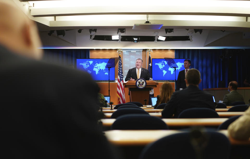 Secretary of State Mike Pompeo speaks during a press conference at the State Department, Wednesday, June 24, 2020 in Washington, as State Department Coordinator for Counterterrorism, Ambassador Nathan Sales, right, look on. (Mandel Ngan/Pool via AP)