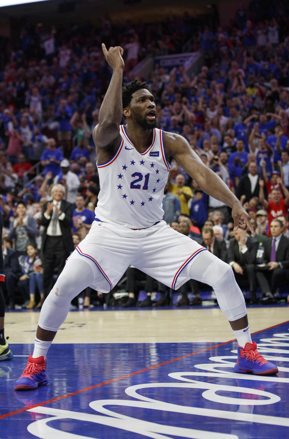 Philadelphia 76ers' Joel Embiid reacts to his dunk during the second half of Game 3 of the team's second-round NBA basketball playoff series against the Toronto Raptors, Thursday, May 2, 2019, in Philadelphia. The 76ers won 116-95. (AP Photo/Chris Szagola)