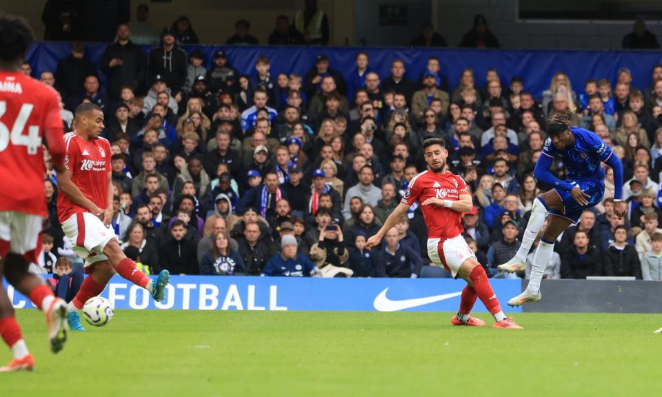 <span>Noni Madueke scores Chelsea’s equaliser against Nottingham Forest at Stamford Bridge.</span><span>Photograph: Neil Hall/EPA</span>