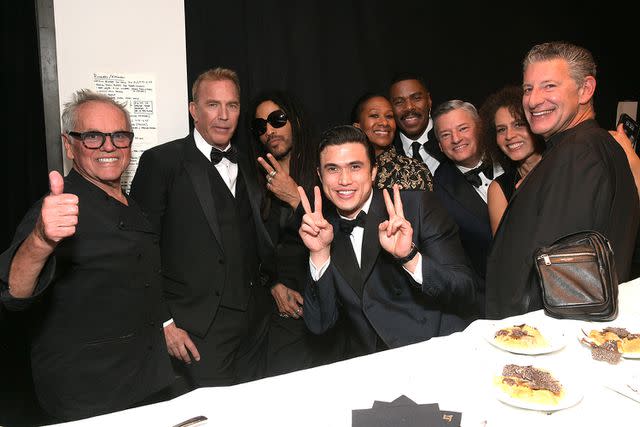 <p>Charley Gallay/Getty Images</p> Wolfgang Puck, Kevin Costner, Lenny Kravitz, Charles Melton, Nicole Avant, Colman Domingo and Ted Sarandos