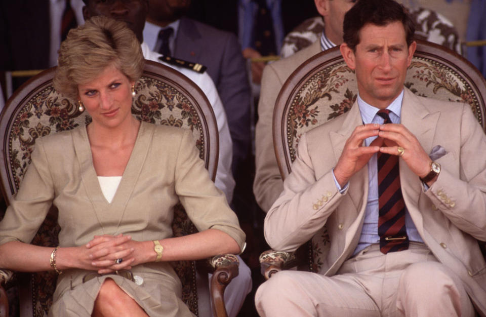 Diana Princess of Wales and Prince Charles watch a dancing display (David Levenson / Getty Images)