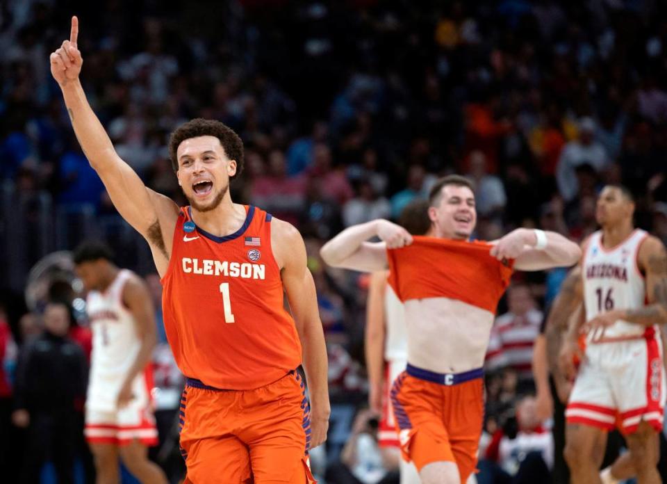 Clemson’s Chase Hunter (1) and Joseph Girard III (11) celebrate the Tigers’ 77-72 victory over Arizona in the NCAA Sweet Sixteen on Thursday, March 28, 2024 at Crypto.com Arena in Los Angeles, CA. Robert Willett/rwillett@newsobserver.com