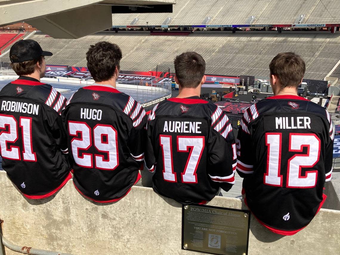 NC State Icepack seniors, from left, Alex Robinson, Victor Hugo, Garrett Auriene and Matt Miller check out outdoor rink at Carter-Finley Stadium on Wednesday, Feb. 15, 2023