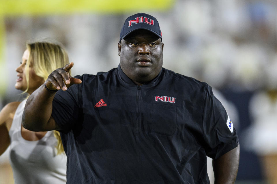 Northern Illinois coach Thomas Hammock celebrates the team's win over Georgia Tech in an NCAA football game Saturday, Sept. 4, 2021, in Atlanta. (AP Photo/Danny Karnik)