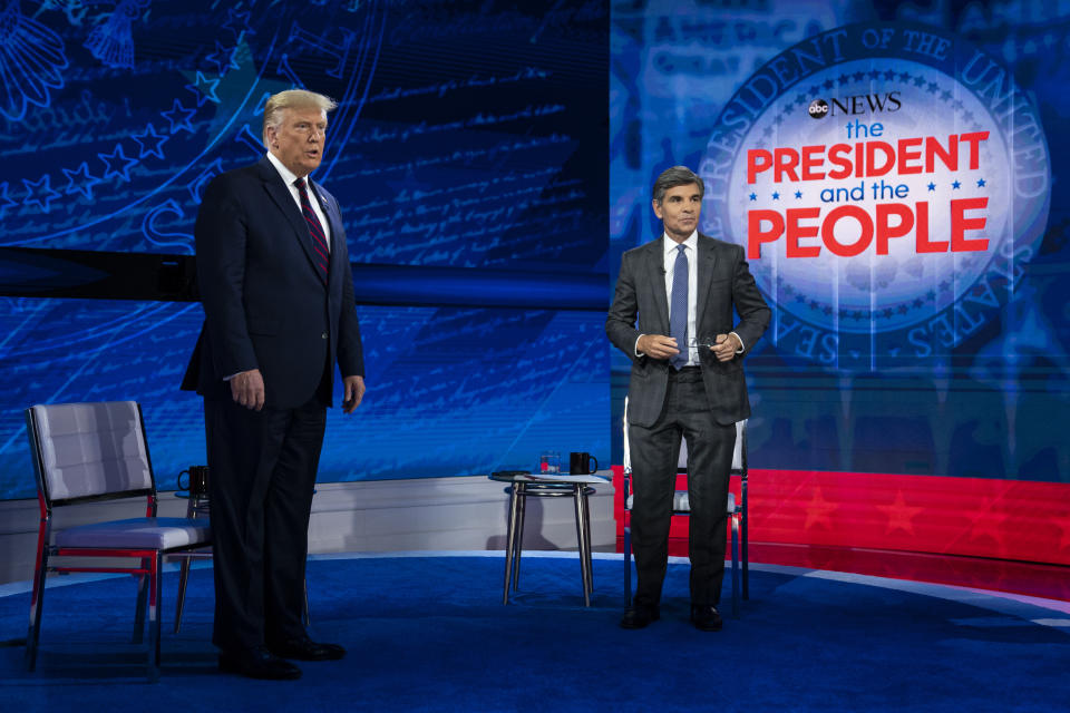 President Donald Trump talks with ABC News anchor George Stephanopoulos before a town hall at National Constitution Center, Tuesday, Sept. 15, 2020, in Philadelphia. (AP Photo/Evan Vucci)