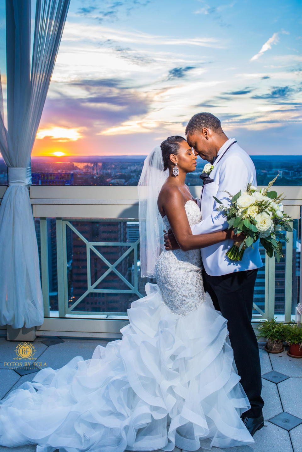 "NaPortia and Kellen&nbsp;had a beautiful Atlanta rooftop wedding. It was simply amazing!" --&nbsp;<i>Afolabi Sogunro&nbsp;&nbsp;</i><strong>&nbsp;&nbsp;</strong>