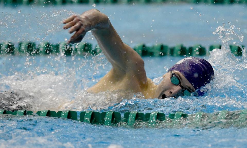 Jackson’s Holden Nist competes in the boys 500-yard freestyle in the Division I district meet at Cleveland State, Saturday, Feb. 17, 2024.