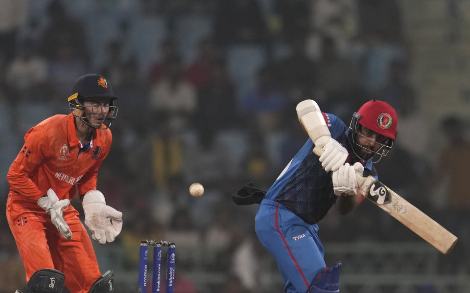Afghanistan's captain Hashimatullah Shahidi plays a shot during the ICC Men's Cricket World Cup match between Afghanistan and Netherlands in Lucknow, India, Friday, Nov. 3, 2023. (AP Photo/Altaf Qadri)