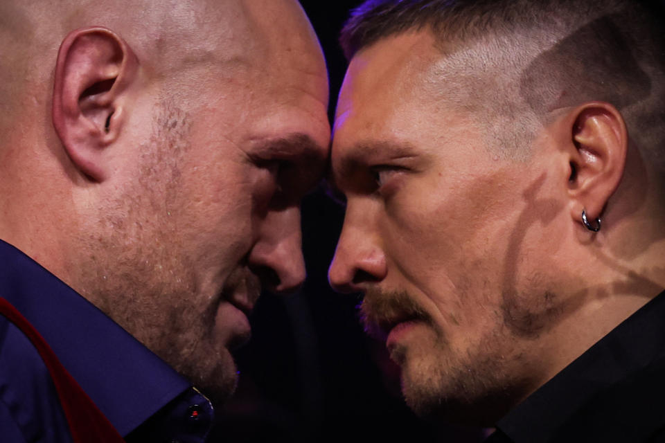 Britain's Tyson Fury (L) and Ukraine's Oleksandr Usyk (R) challenge each other during a press conference, in London, on November 16, 2023, ahead of their undisputed heavyweight world championship contest, taking place on February 17, 2024 in Riyadh, Saudi Arabia. (Photo by Daniel LEAL / AFP) (Photo by DANIEL LEAL/AFP via Getty Images)