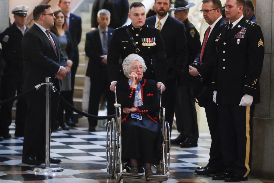 Annie Glenn arrives to view the casket of her husband John Glenn as he lies in honor, Friday, Dec. 16, 2016, in Columbus, Ohio. Glenn's home state and the nation began saying goodbye to the famed astronaut who died last week at the age of 95. (AP Photo/John Minchillo)