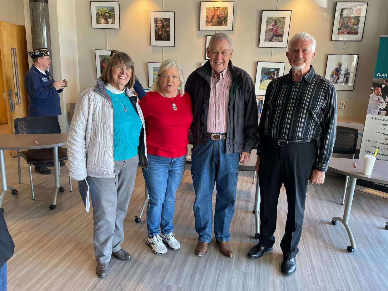 From left, Zeta Smith, Haywood County Veterans Services Officer Debbie Caldwell, veteran O'Neal Shelton and Madison County Veterans Services Director Dan Jackson pose for a photo at the veterans health benefits fair in Marshall April 6.