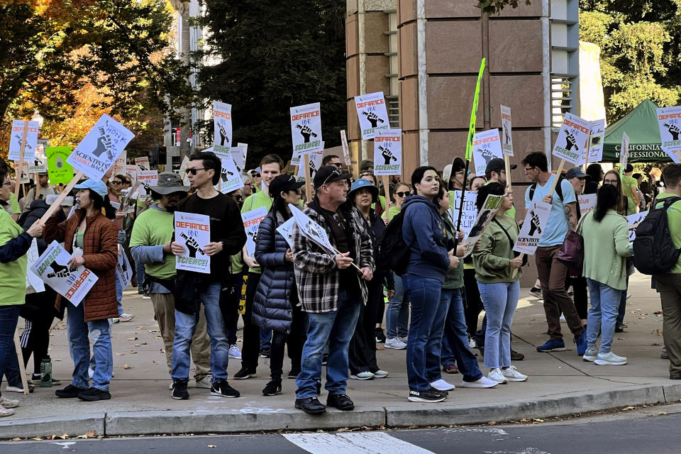 Scientists who work for California picketed outside of the California Environmental Protection Agency building in Sacramento, Calif. on Nov. 16, 2023, on day two of a three-day strike as they seek higher wages. California Association of Professional Scientists, the union representing the workers, argues they are drastically underpaid compared to engineers and other state employees. (AP Photo/Sophie Austin)