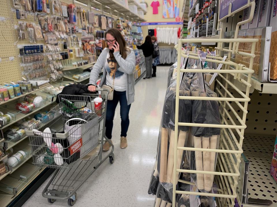 A shopper browses one of several crafts aisles in the Hobby Lobby in Christiana.