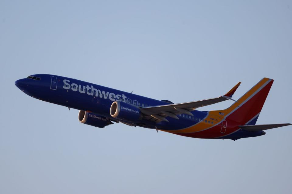 <p>Kevin Carter/Getty</p> A Southwest Airlines Boeing 737 MAX8