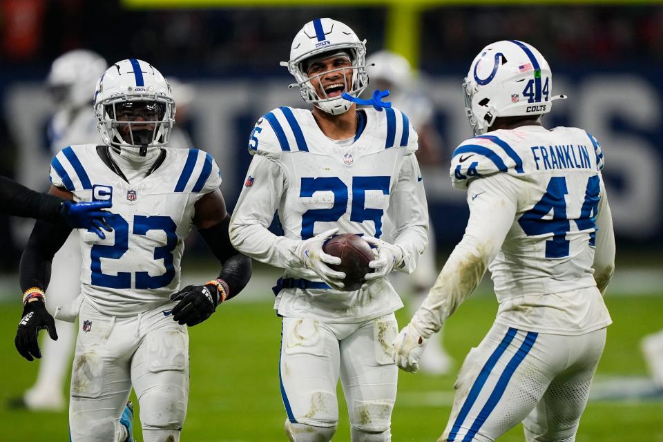 Indianapolis Colts safety Rodney Thomas II (25) celebrates his game-sealing interception in the second half of an NFL football game against the New England Patriots in Frankfurt, Germany Sunday, Nov. 12, 2023. The Colts won 10-6. (AP Photo/Martin Meissner)