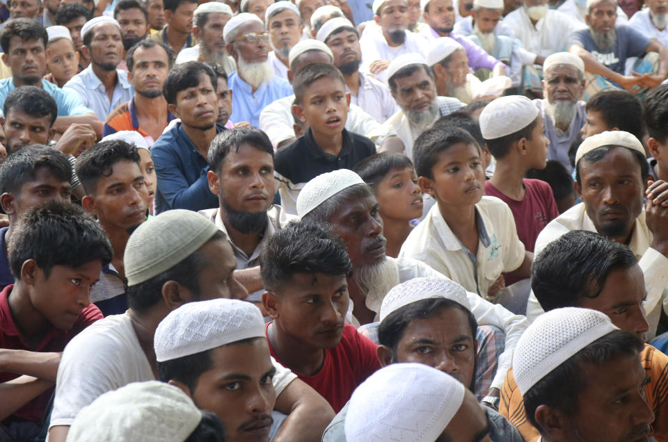 Rohingya refugees gather to mark the fifth anniversary of their exodus from Myanmar to Bangladesh, at a Kutupalong Rohingya refugee camp at Ukhiya in Cox's Bazar district, Bangladesh, Thursday, Aug. 25, 2022. Hundreds of thousands of Rohingya refugees on Thursday marked the fifth anniversary of their exodus from Myanmar to Bangladesh, while the United States, European Union and other Western nations pledged to continue supporting the refugees' pursuit of justice in international courts.(AP Photo/ Shafiqur Rahman)