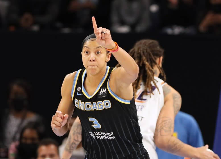 The Sky's Candace Parker reacts after scoring a basket against the Mercury during Game 3 of the WNBA Finals