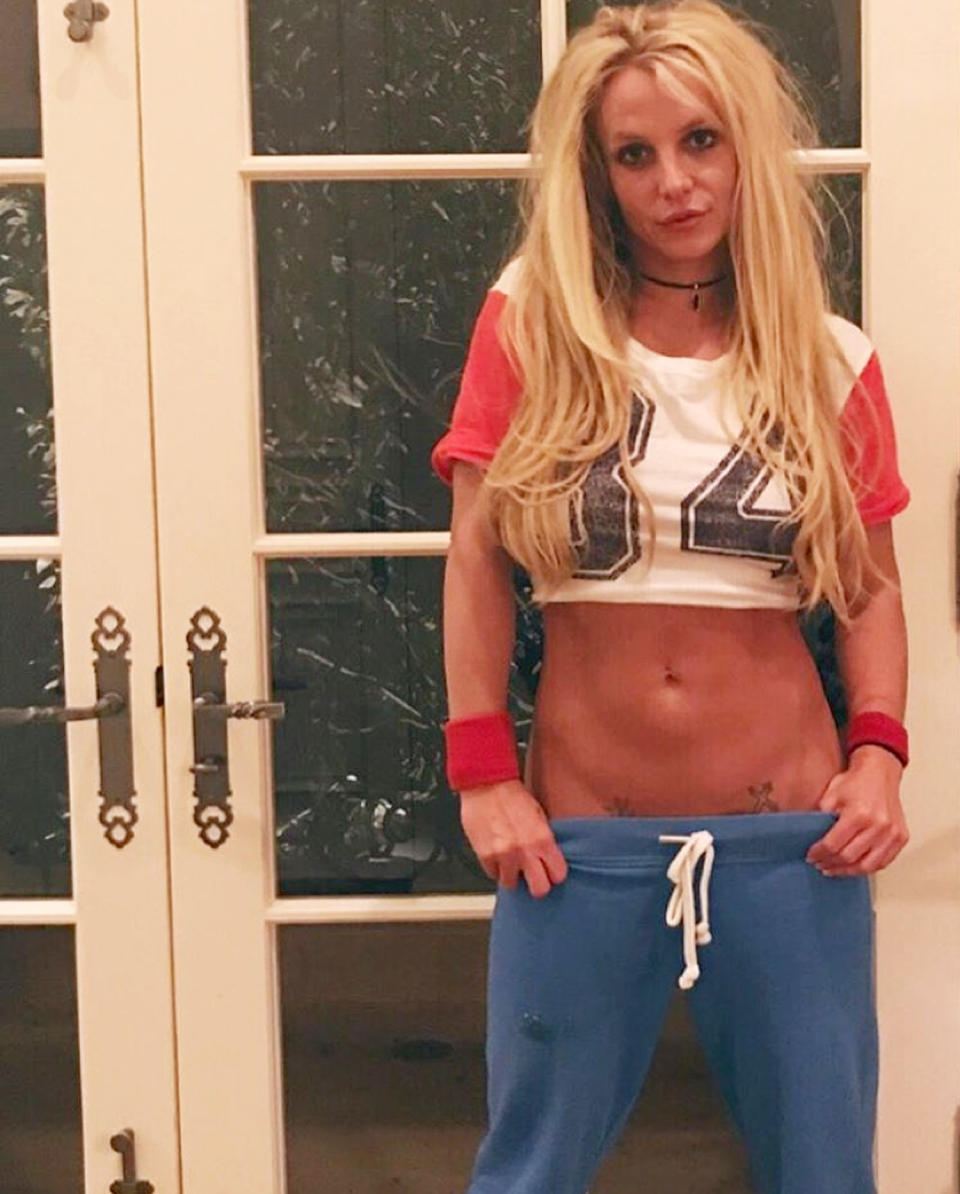 <p>The first rule of having abs as good at Britney's: find a way to show them off at any cost, even when your t-shirt and sweats are trying to sabotage you.</p>