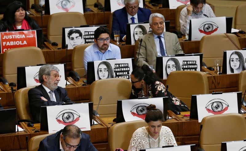 Lawmakers of the opposition debate and vote on an impeachment motion against Chile's President Sebastian Pinera, at a session at the congress in Valparaiso