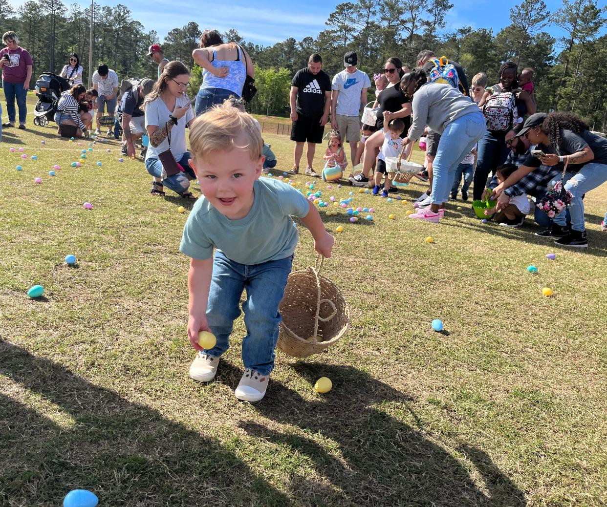 FILE - Families enjoy egg hunts, visiting the Easter Bunny, and other outdoor activities at Columbia County's annual Easter Egg Scramble at Patriots Park in Grovetown on Sunday, April 2, 2023. The scramble will return on March 30.