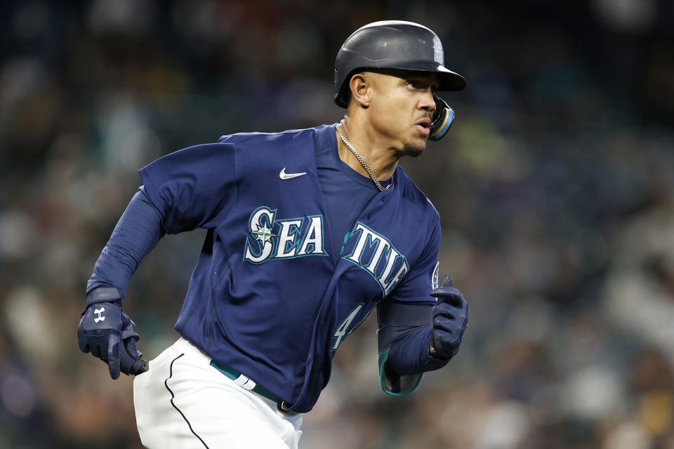 SEATTLE, WASHINGTON - MAY 07: Julio Rodriguez #44 of the Seattle Mariners watches his triple during the fifth inning against the Tampa Bay Rays at T-Mobile Park on May 07, 2022 in Seattle, Washington. (Photo by Steph Chambers/Getty Images)