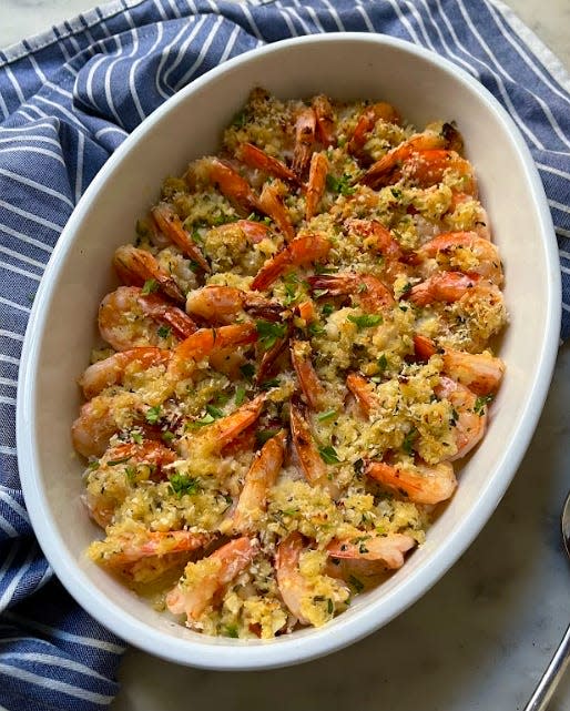 Baked shrimp scampi in a white dish