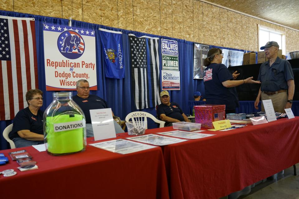Republican Party of Dodge County members spoke with potential voters visiting their booth at the Dodge County Fair on Friday, Aug. 18, 2023.