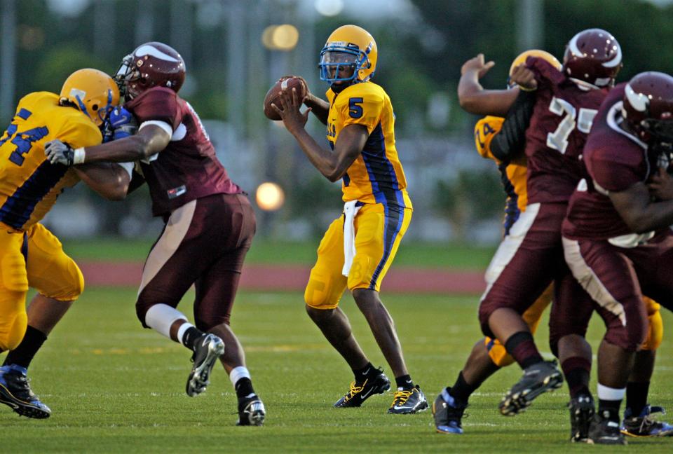 Miami Northwestern quarterback Teddy Bridgewater looks to pass against Norland High School in 2010.