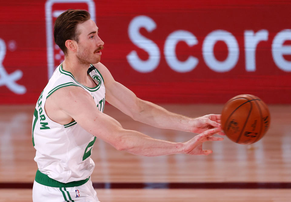 Gordon Hayward of the Boston Celtics handles the ball during the second half of an NBA basketball game Tuesday, Aug. 11, 2020, in Lake Buena Vista, Fla. (Mike Ehrmann/Pool Photo via AP)