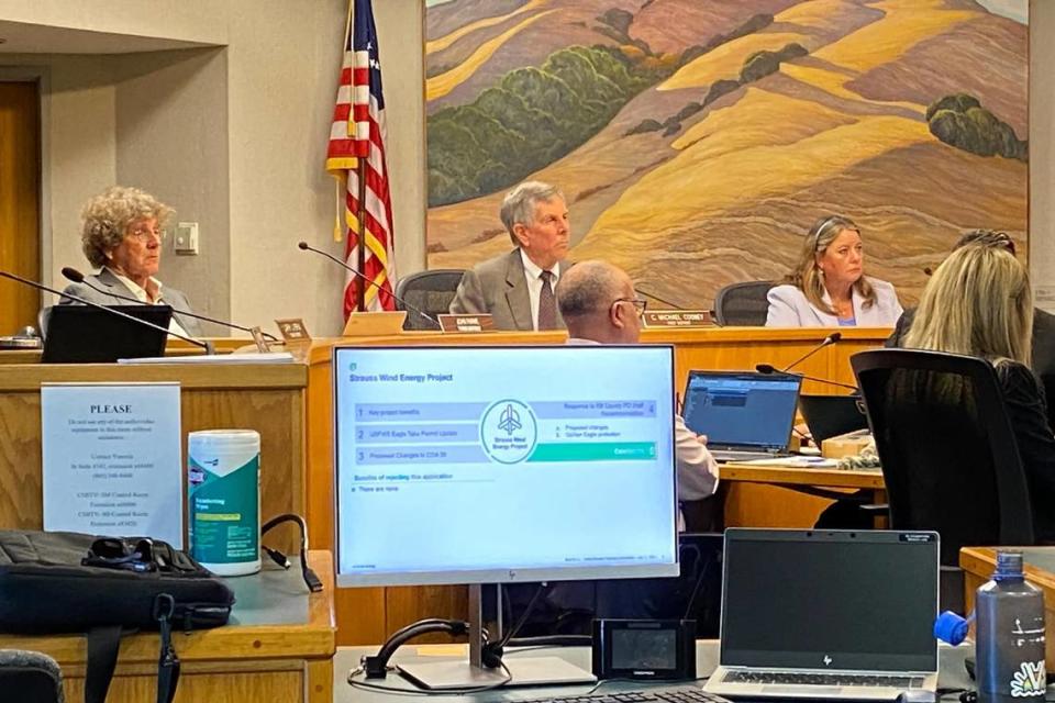 Santa Barbara County Planning Commission Chair John Parke plus Commissioners C. Michael Cooney and Laura Bridley listen during a discussion about the Strauss Wind Energy Project southwest of Lompoc.