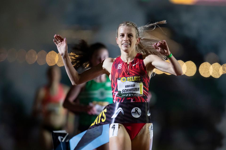 Karissa Schweizer crosses the finish line to win the women’s 1,500 meters on day two of the Oregon Relays Saturday, April 20, 2024, at Hayward Field in Eugene, Ore.